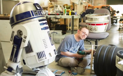 Two R2-D2 builders club members working on Rogue One