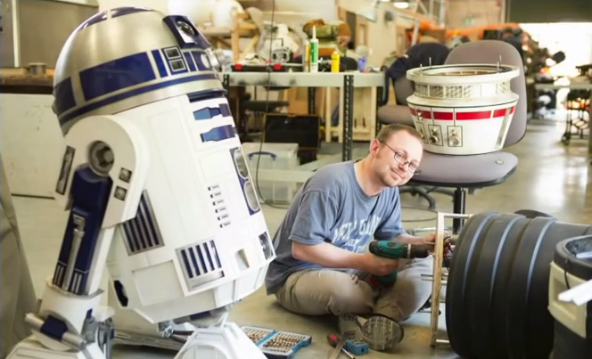 Two R2-D2 builders club members working on Rogue One