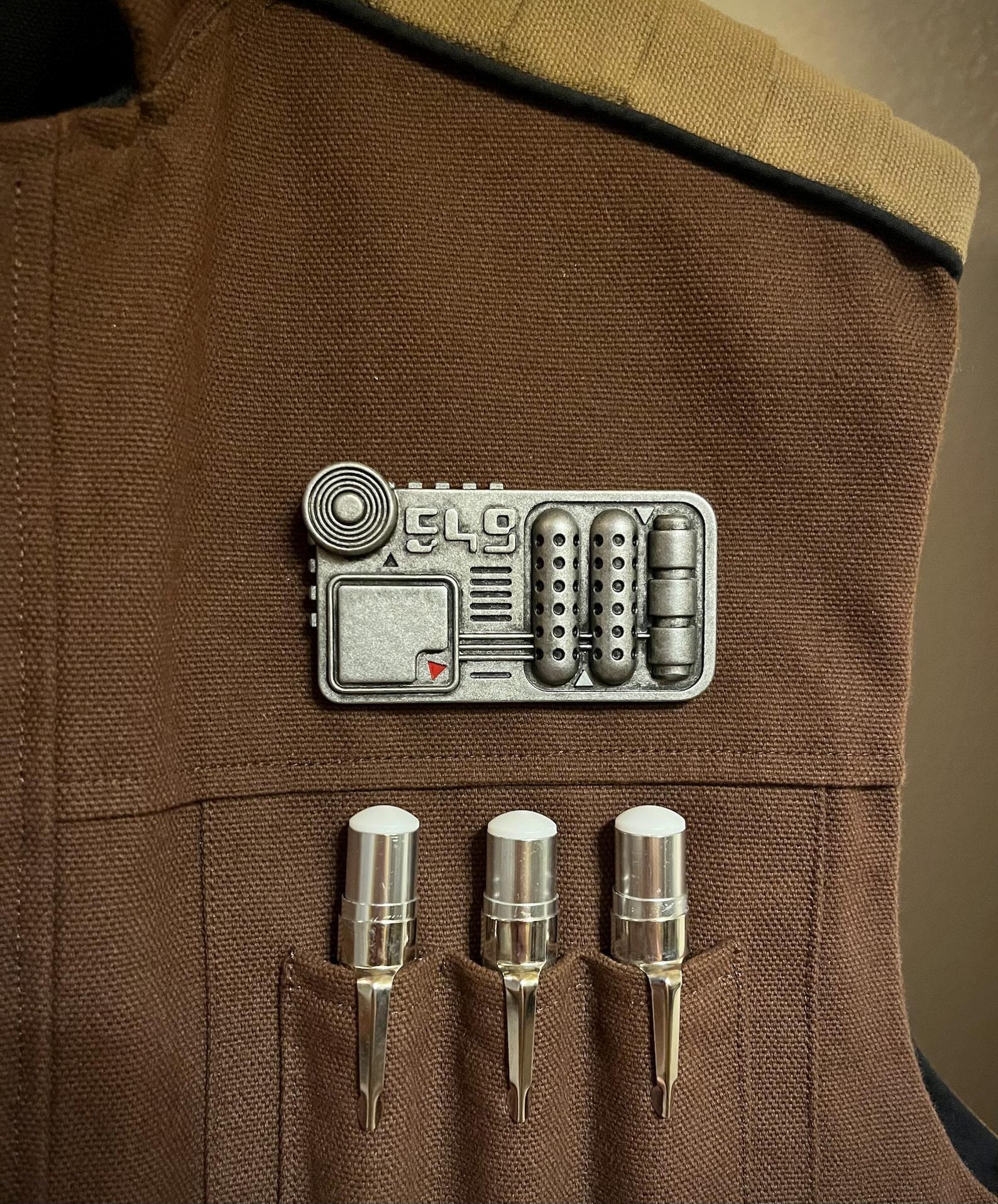 SW Inspired "Smuggler's Comlink" 549 Edition Magnetic Badge 2